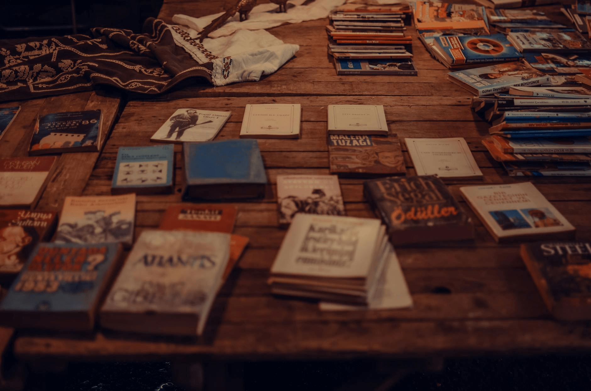 collection of books on wooden surface